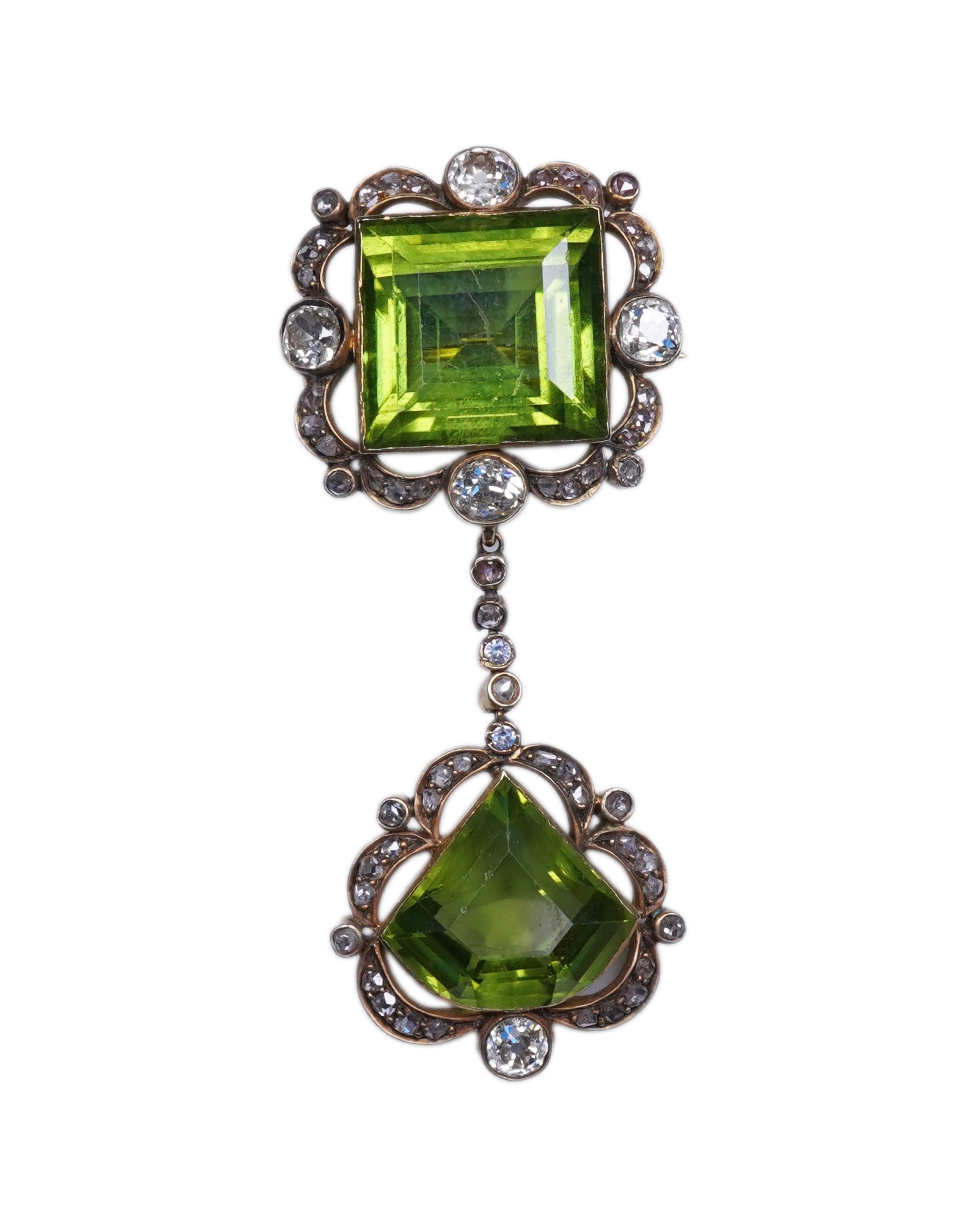 A peridot and diamond brooch, circa 1900